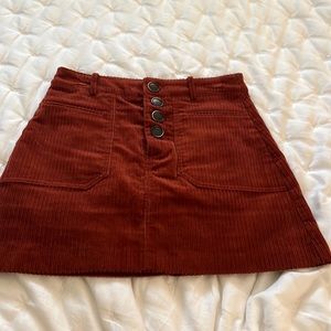 Burnt orange corduroy mini skirt from Zara. Size small.